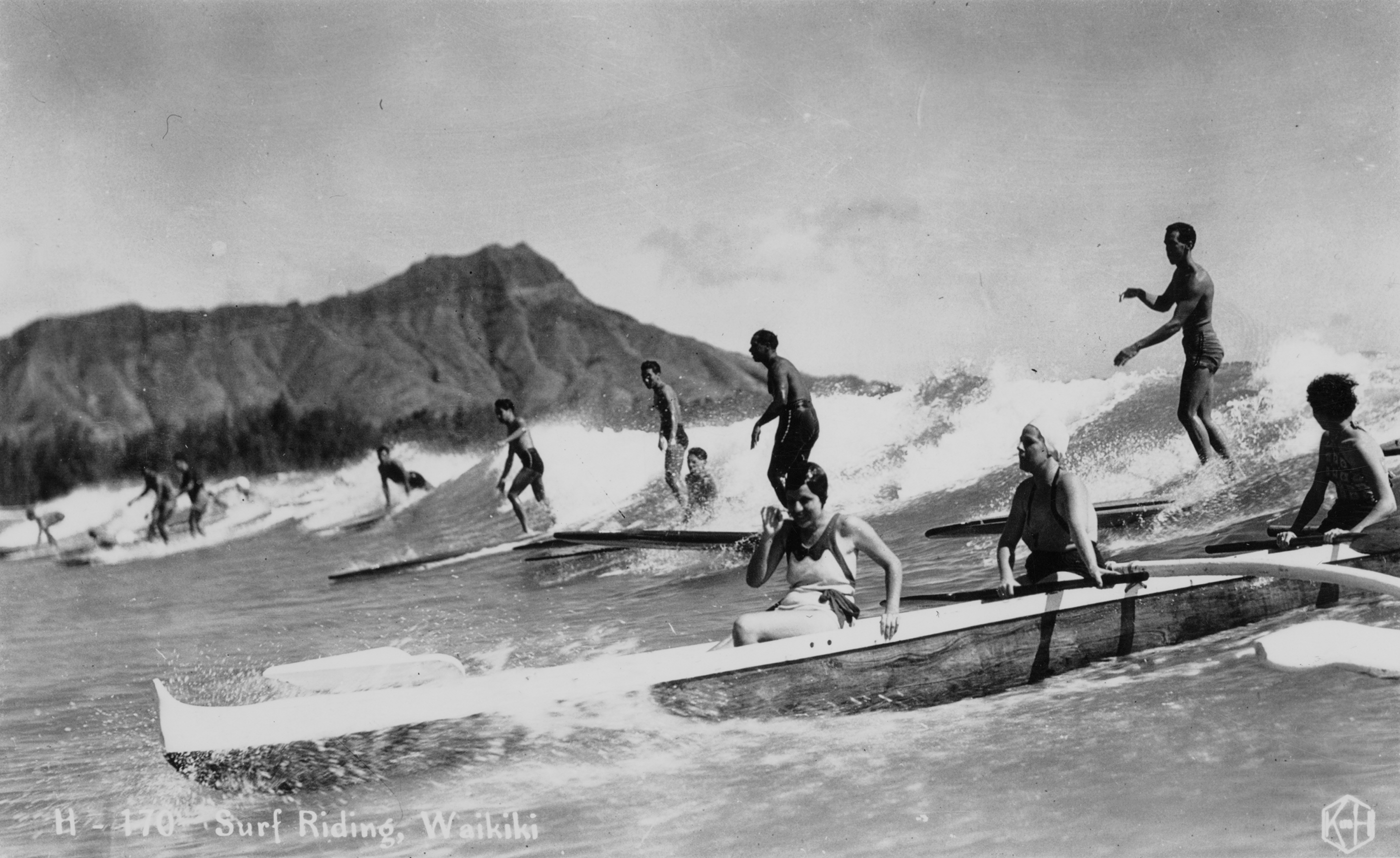 [Pākā waʻa] Postcard showing canoe surfing with Diamond Head in background; Oʻahu, Hawaiʻi, ca. 1935. Photo by Kodak Hawaiʻi, Bishop Museum Archives. Used with permission.